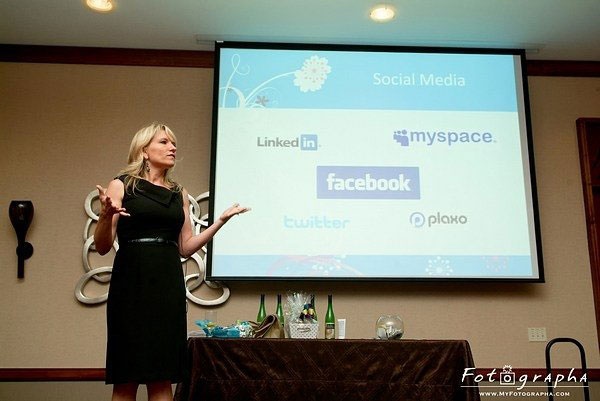Lei Lydle speaking about online marketing to a group of wedding professionals.